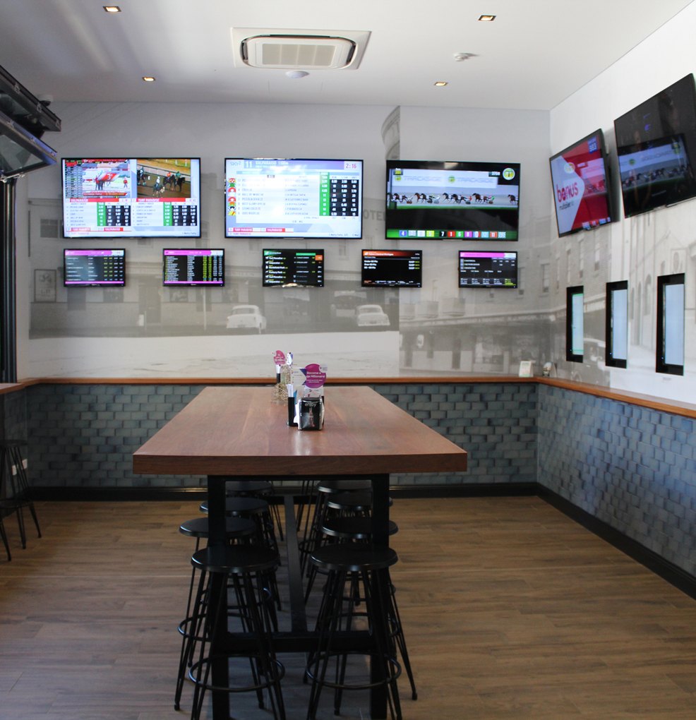 Wall of screens in the sports bar